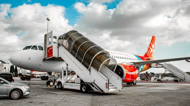 round trip vs one way flights cost analysis 2026